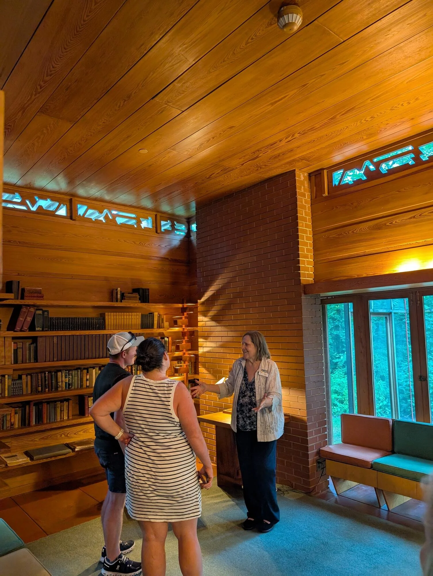 Guests inside Pope-Leighey House at twilight