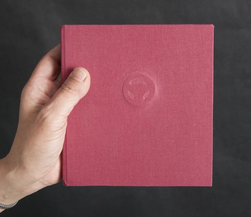 A hand-made tofu book, Family Cars is a sequence of my family's photographs. The range from before the 1950's to the 90's. This is hand-bound book made in 2014. This is a one-of-a-kind edition.