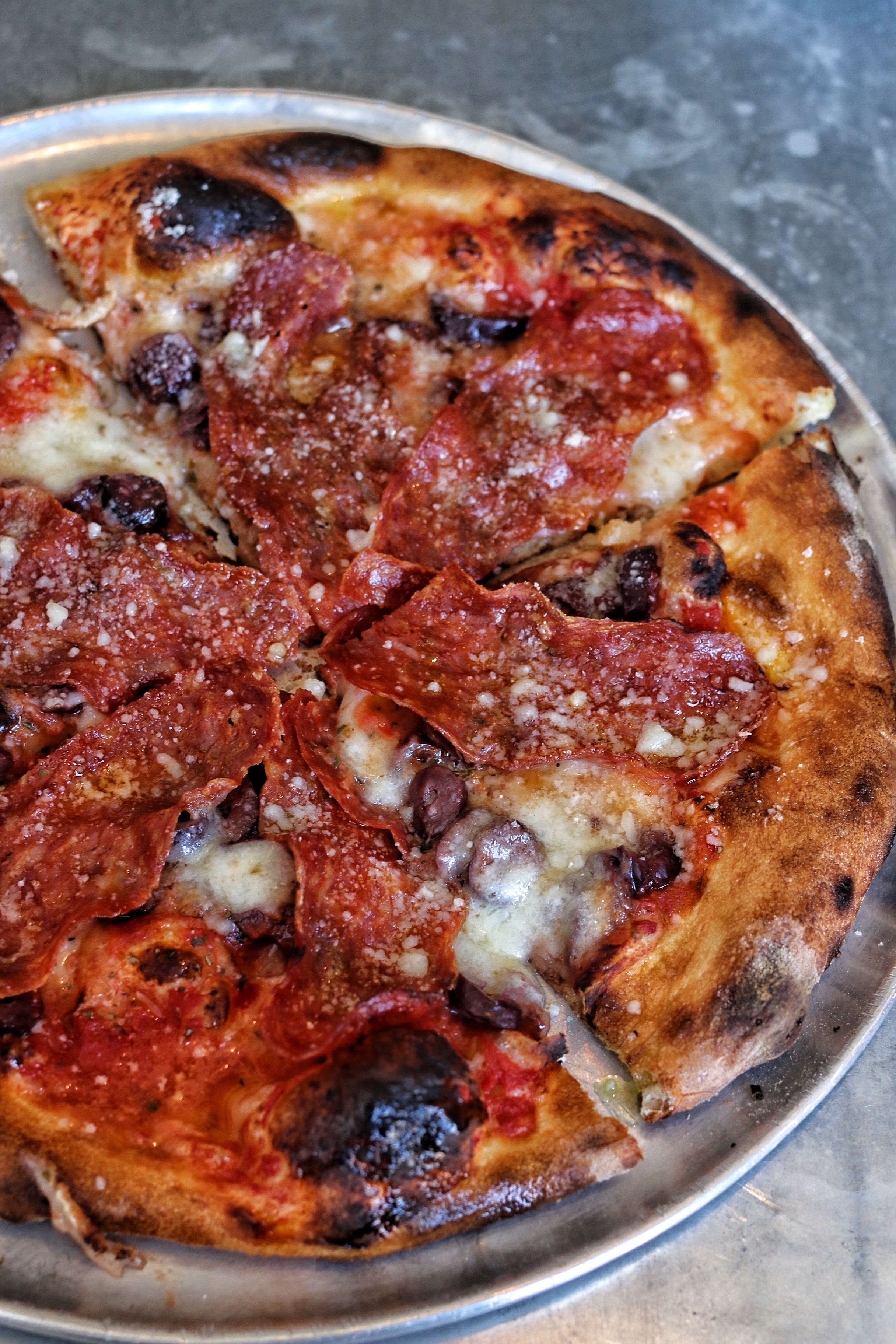  pizza- tomato, spicy salami, olives, bualo mozzarella 