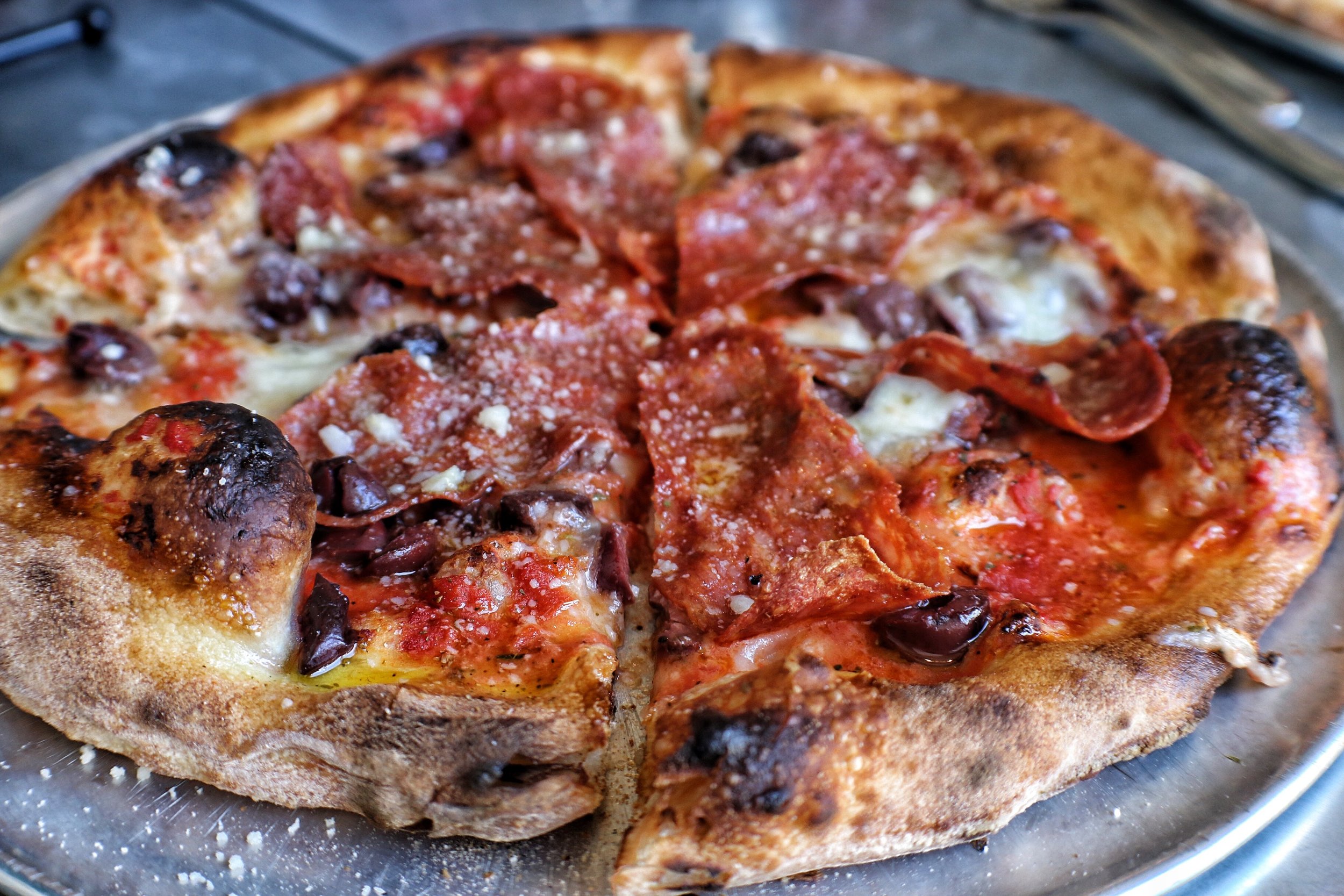  pizza- tomato, spicy salami, olives, bualo mozzarella 