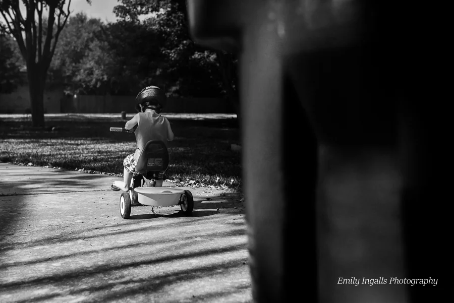 Sawyer's still trying to get the whole pushing the pedals on the tricycle thing.