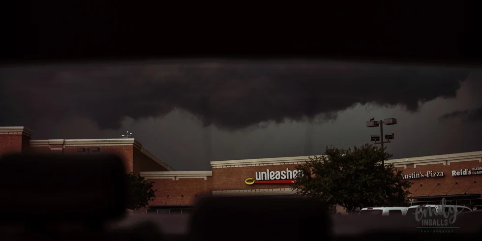 View out the back of my car. I was parked in a parking lot.