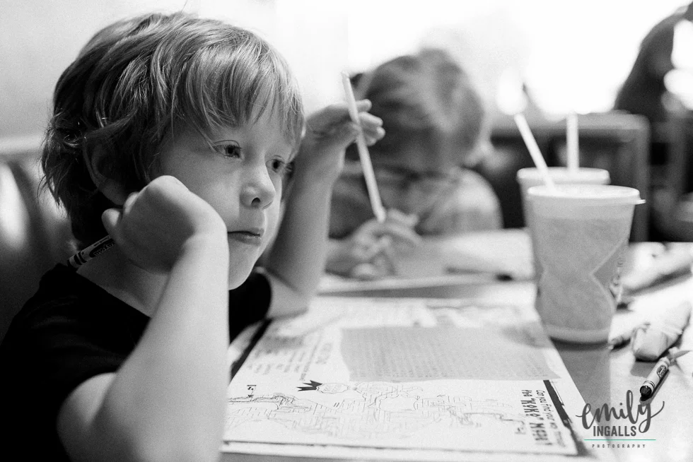 Contemplating his word search and place mat