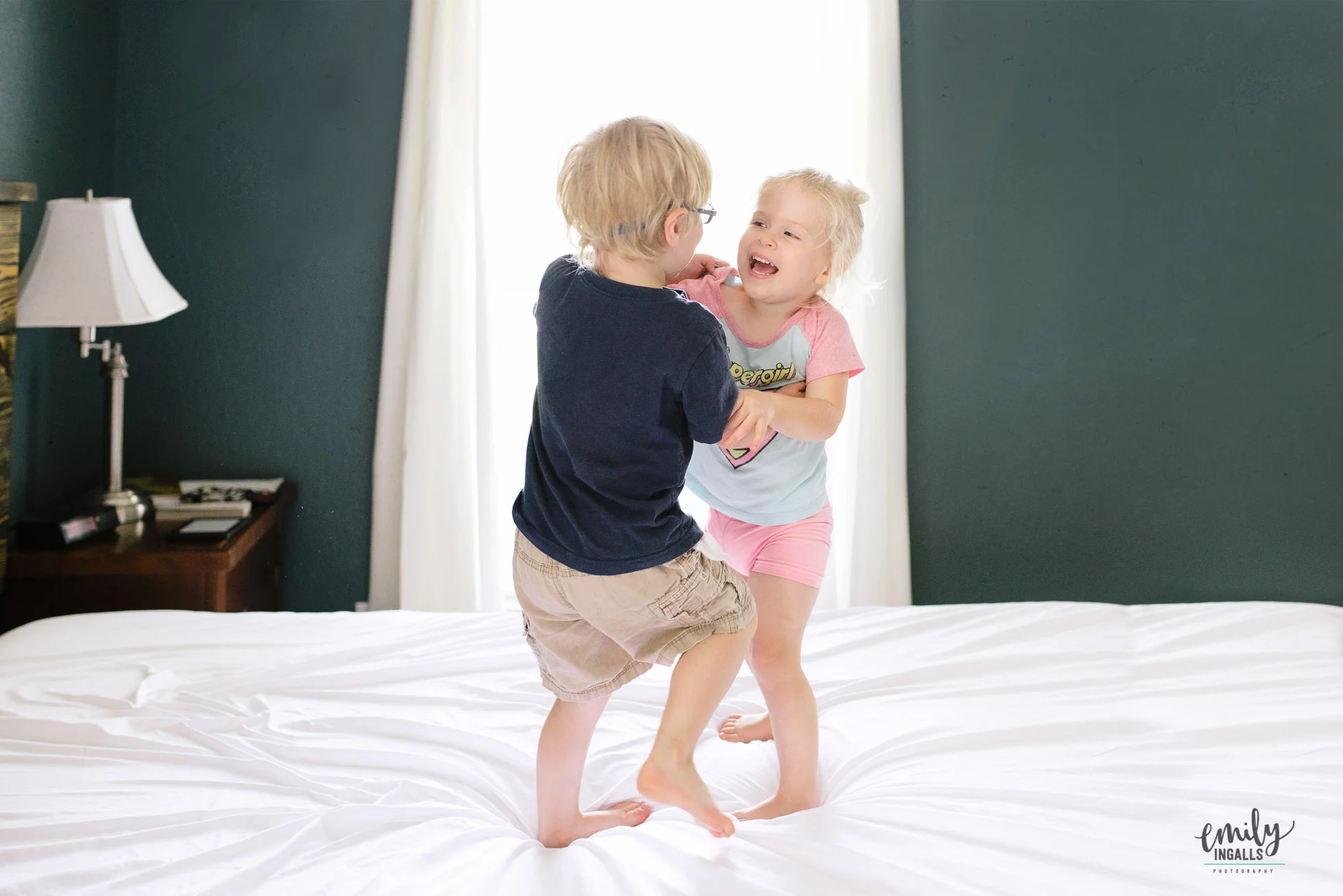 Playing on Mom's bed.jpg