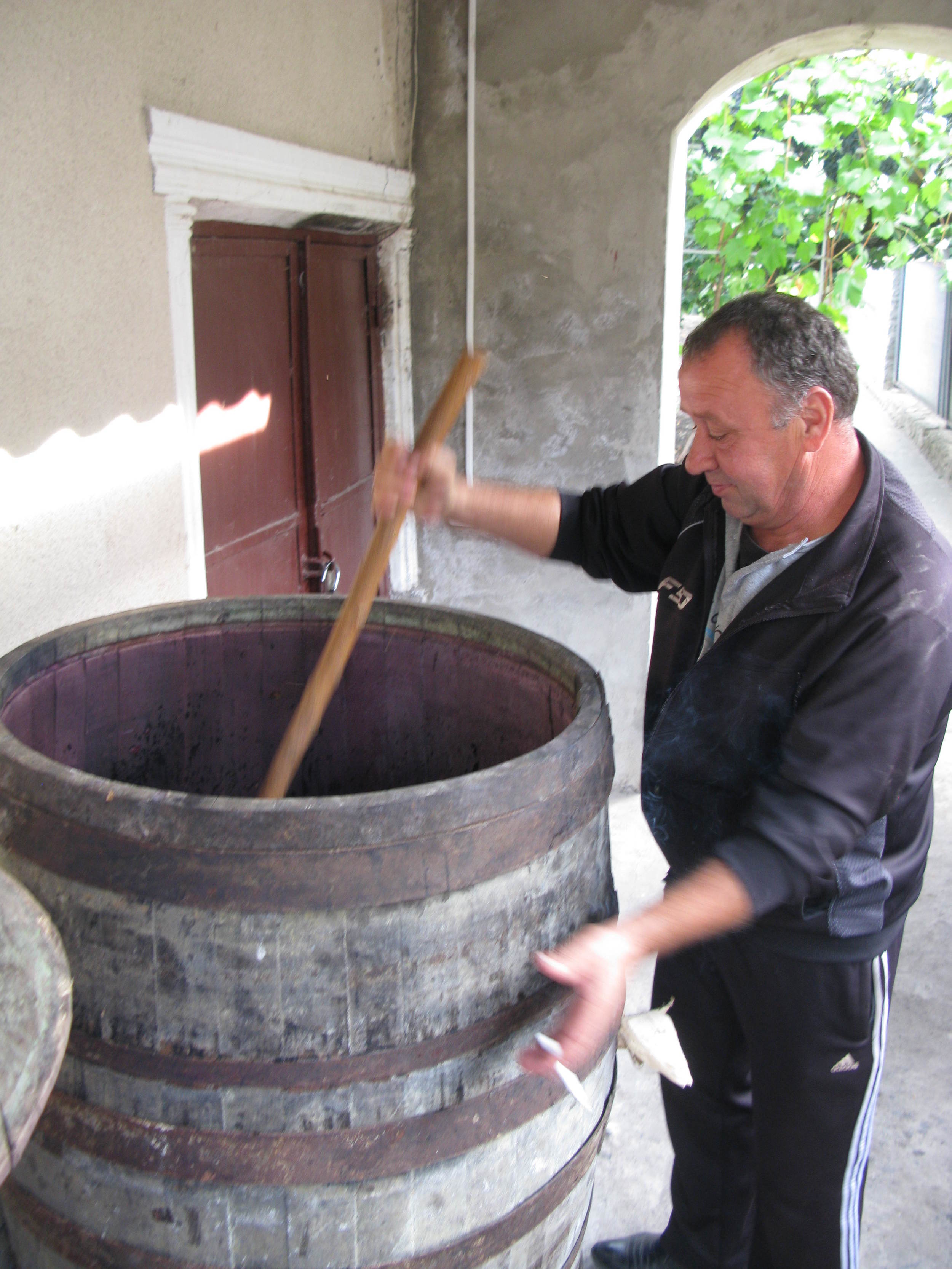 Punching Down the Homemade Red Wine
