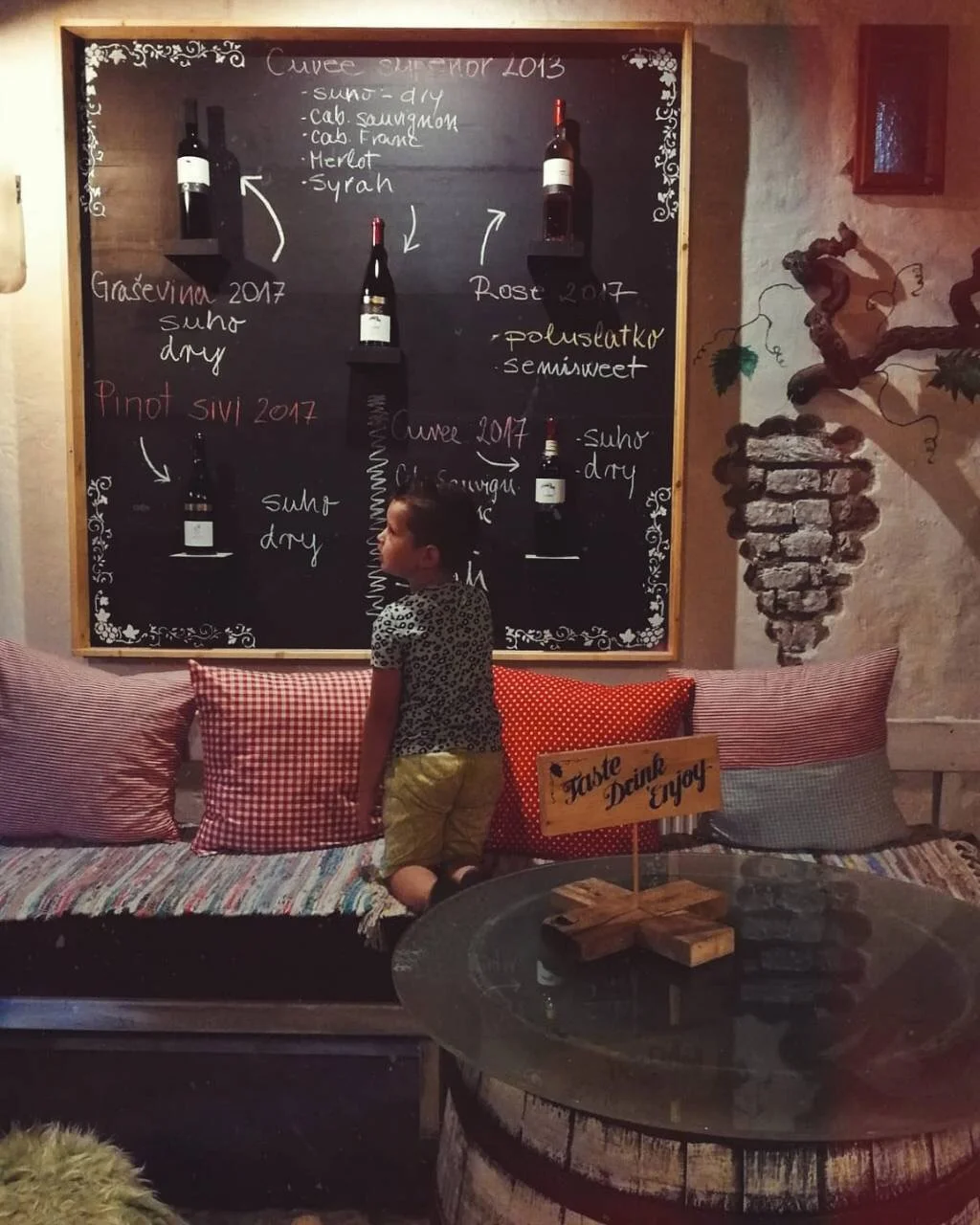 Still too young to taste the wine, but hopefully he will adopt her passion for wine.