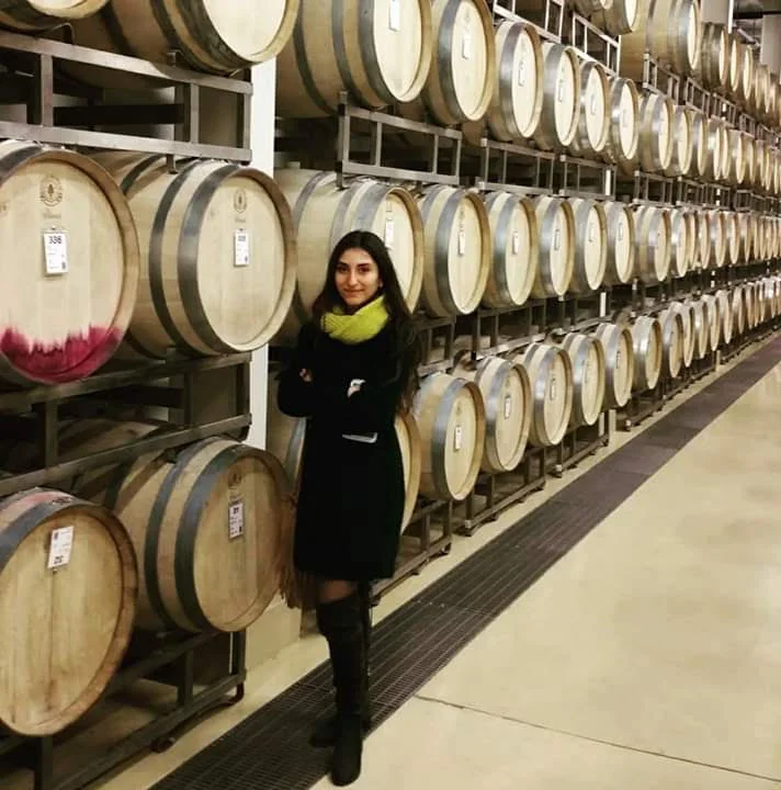 In the Karas Wines barrel room.