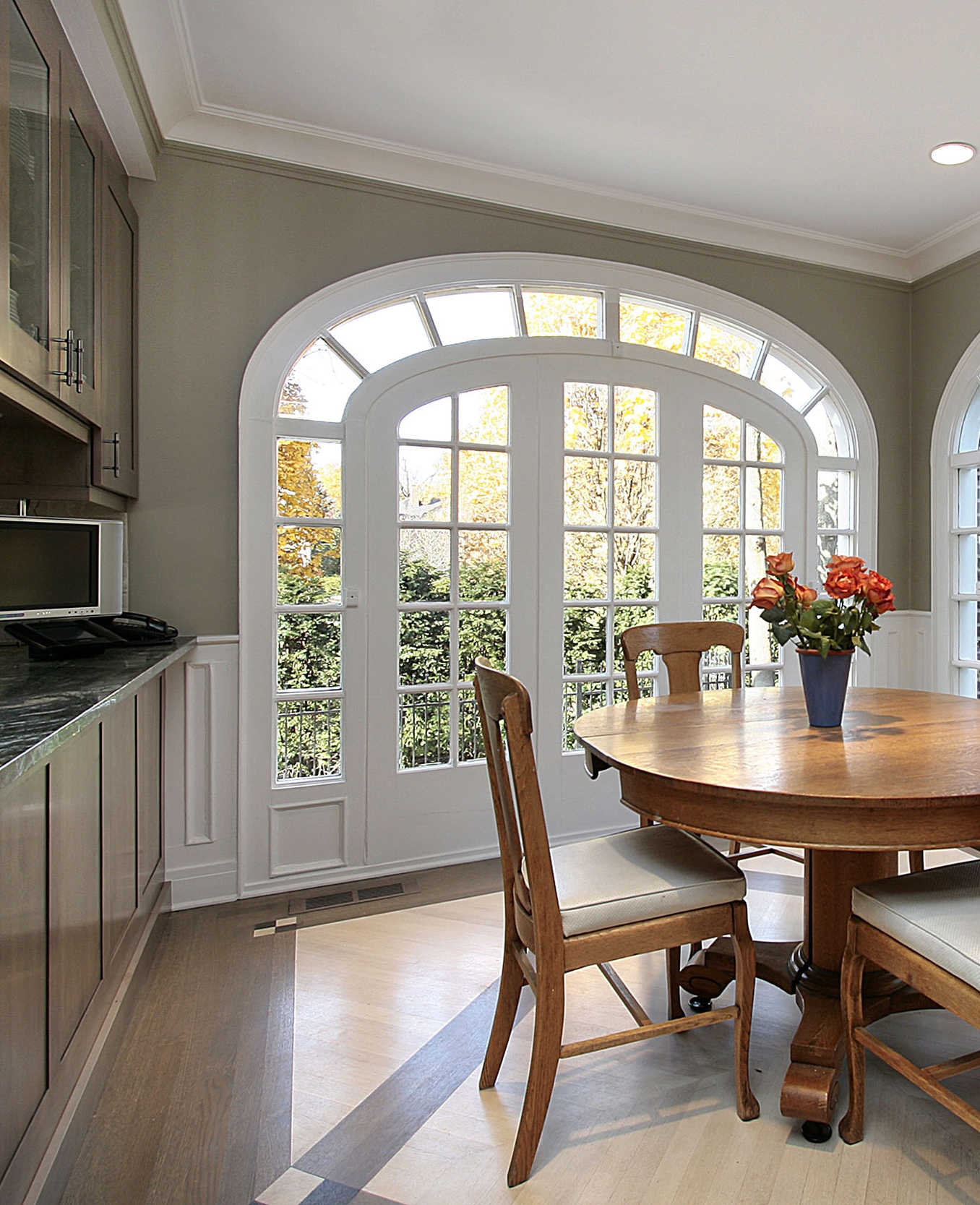 Breathtaking Arched Windows Offer View to Lush Grounds