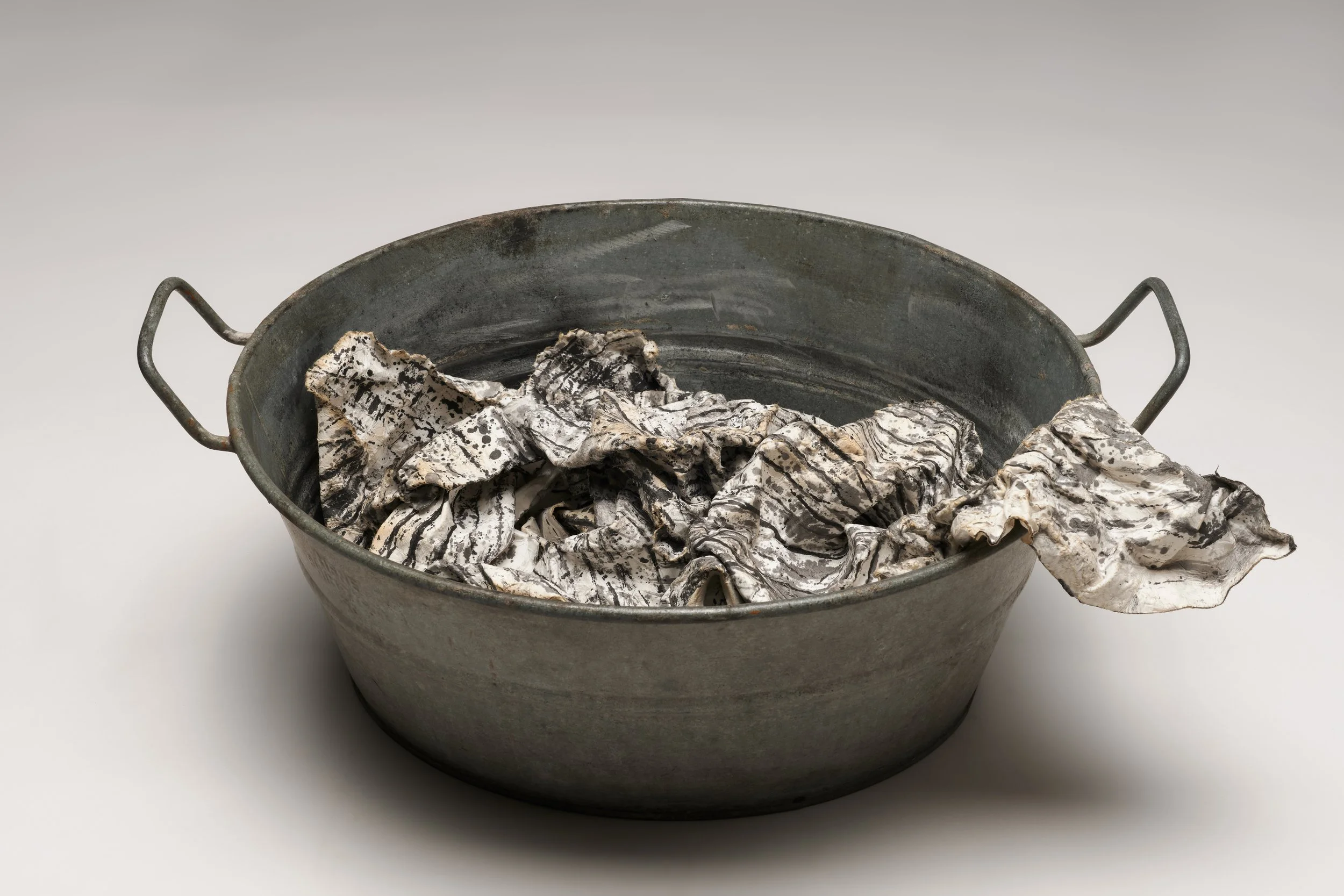  What Remains 6, 2025 vintage galvanized metal washtub, India ink, blotter paper 10” x 22.5” x 16.5” 