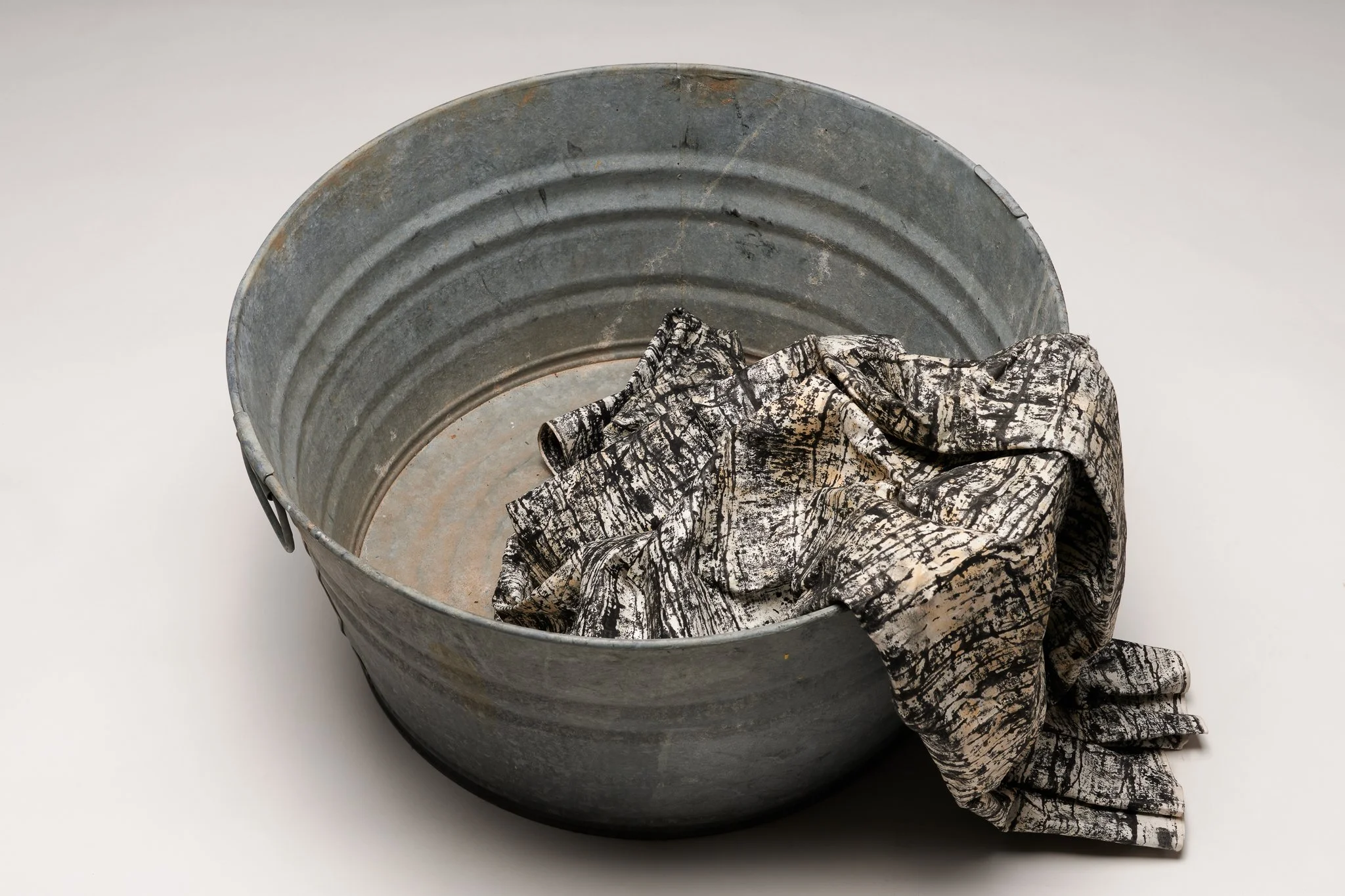  What Remains 1, 2025 vintage galvanized metal washtub, India ink, blotter paper 13” x 22” x 22” 