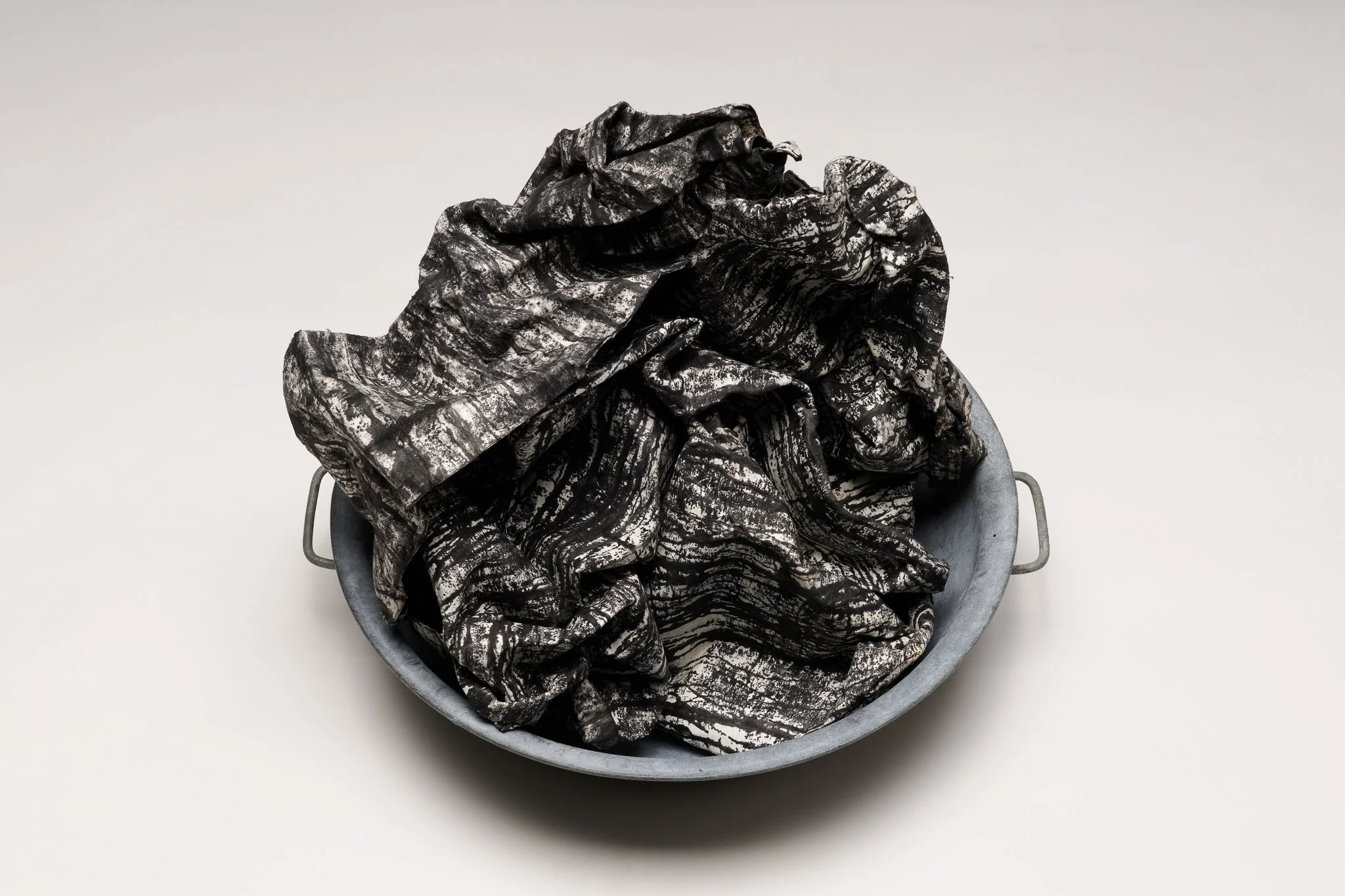  What Remains 2, 2025 vintage galvanized metal washtub, India ink, blotter paper 14” x 17” x 17” 