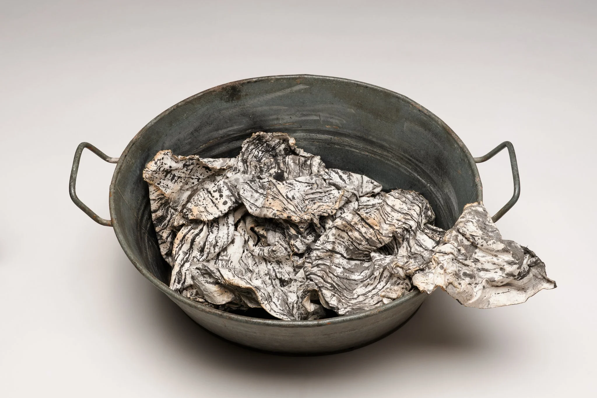 What Remains 6, 2025 vintage galvanized metal washtub, India ink, blotter paper 10” x 22.5” x 16.5” 