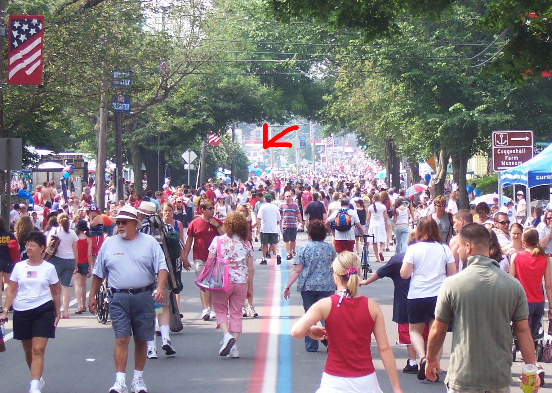 Bristol's 4th of July (post) Parade. The crowds disburse. The arrow points to Hope Diner.