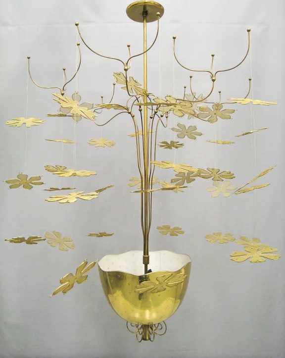 Custom-made ceiling lamp in brass for the Restaurant Kaupunginkellari, Helsinki, Finland 1947. Manufactured by Taito Oy. Image copyright by Helsingin Kaupunginmuseo.