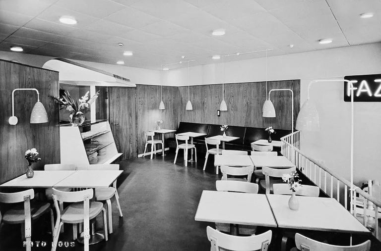Cafe Fazer, Helsinki, late 1950s with Alvar Aalto furniture and pendant lamps model J-1979 by Paavo Tynell for Idman Oy.