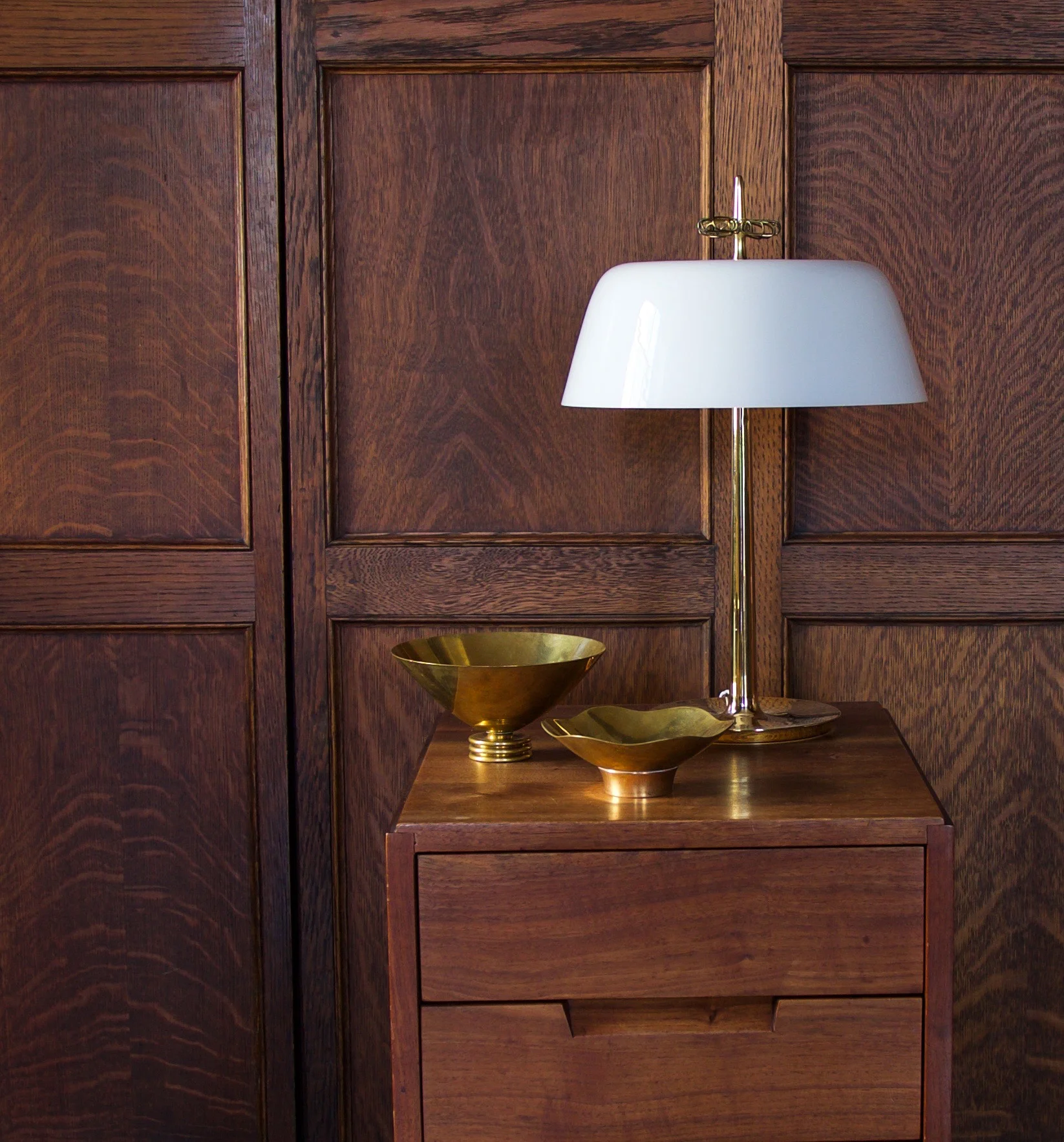 Brass table lamp with opaline glass shade, model no.9211, Taito Oy, late 1940s. Cone-shaped brass bowl also by Taito Oy, c.1940s. Image copyright by The Exchange Int.