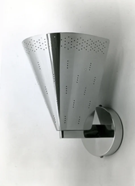 Wall light model no.9203, Taito Oy, early 1950s. Materials polished perforated brass.