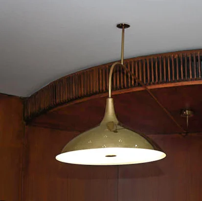 Restaurant Laulumiehet, Helsinki, 1949. Custom-made variation of the model 1965 ceiling lamp with brass stem.