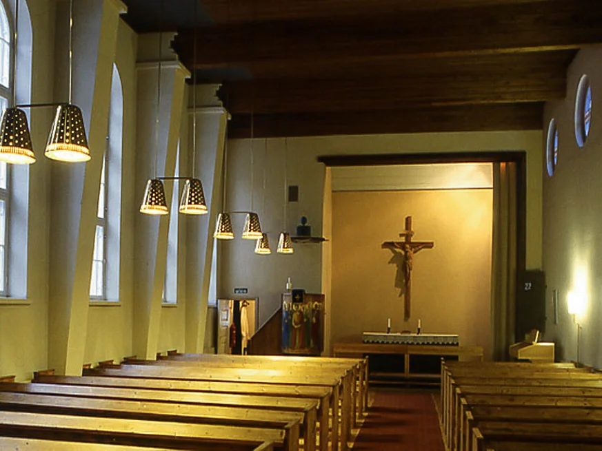 Kytäjä Church, Finland, 1939, architect Väinä Vähäkallio. Perforated brass ceiling lights by Paavo Tynell and Taito Oy.
