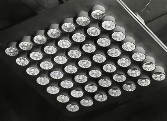 Large mounted ceiling lamp panel of 79 lighting sources with brass wire spirals, Taito Oy, late 1940s. Image copyright by the British Council of Industrial Design.