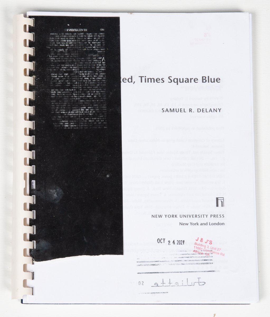  Xerox Reader: Xerox Text (Times Square Red, Times Square Blue); Xerox Images; Toner; Ink; Gelatin Silver Contact Print made from Paper Negative (REVELATIONS); Comb-binding; Foil Tape; Self-Inking Stamps (J &amp; J’s, Building 3, Unit 27; Dates); Sta