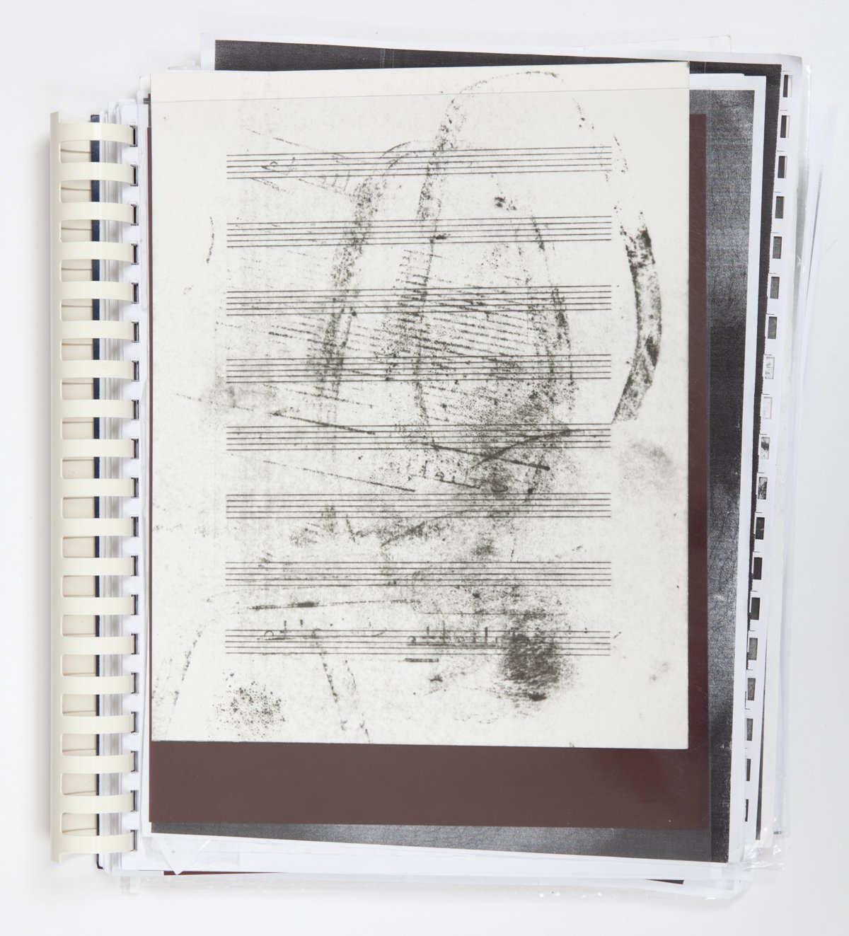  Comb-binding, text and image reproductions on paper, toner, self-inking stamps, coupons, flyers and other found materials gathered from my immediate environment.   Dimensions variable, dates variable (2015-2026).  