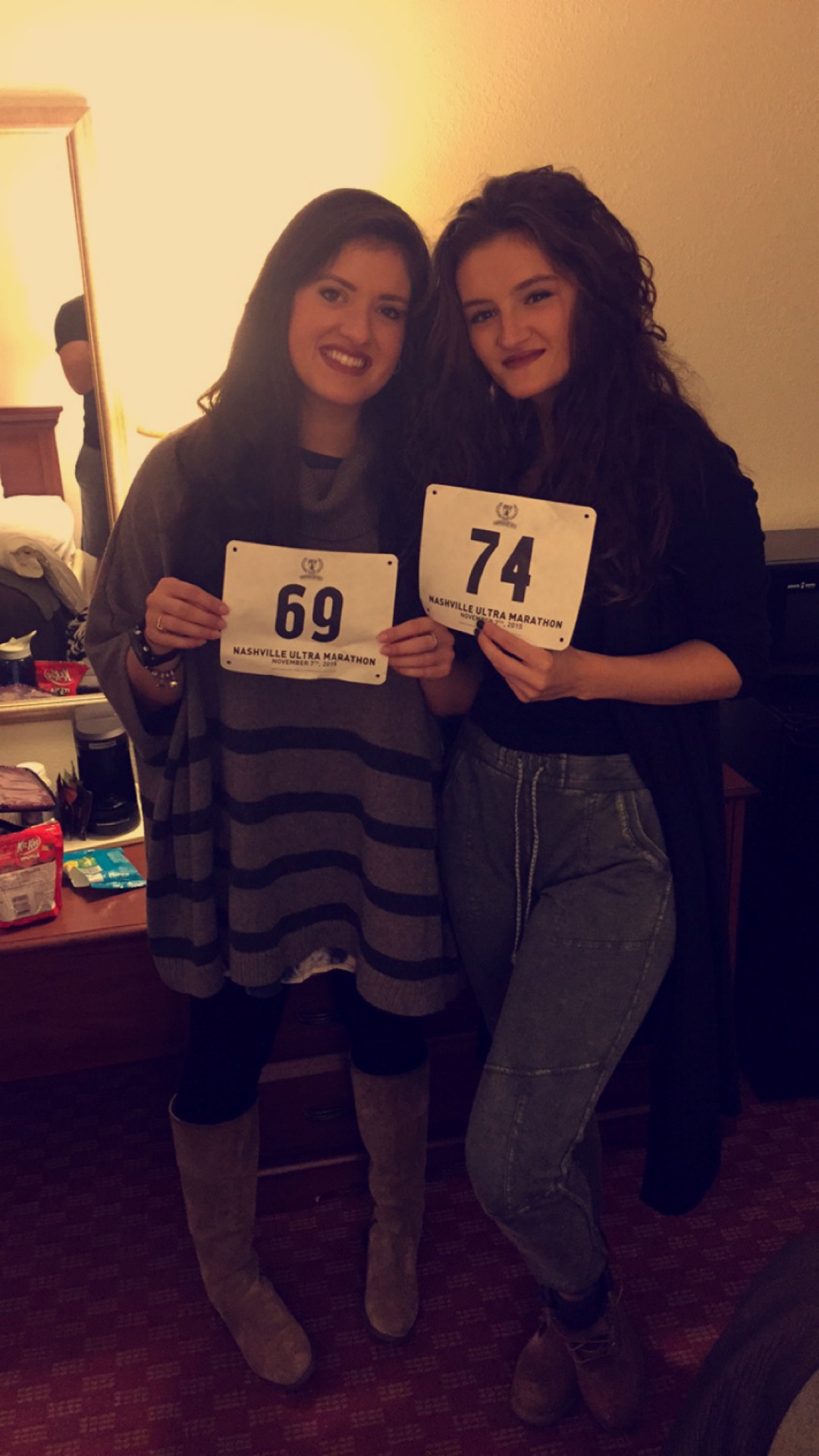 At the hotel with our race bibs