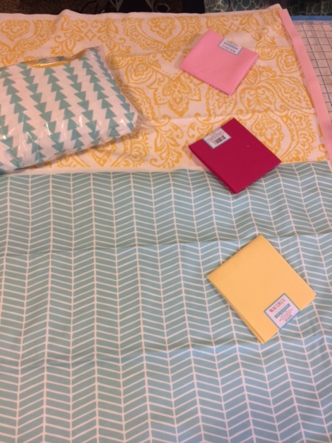 Just a little sneak peak of the nursery color inspirations and some of the fabric we are using! 