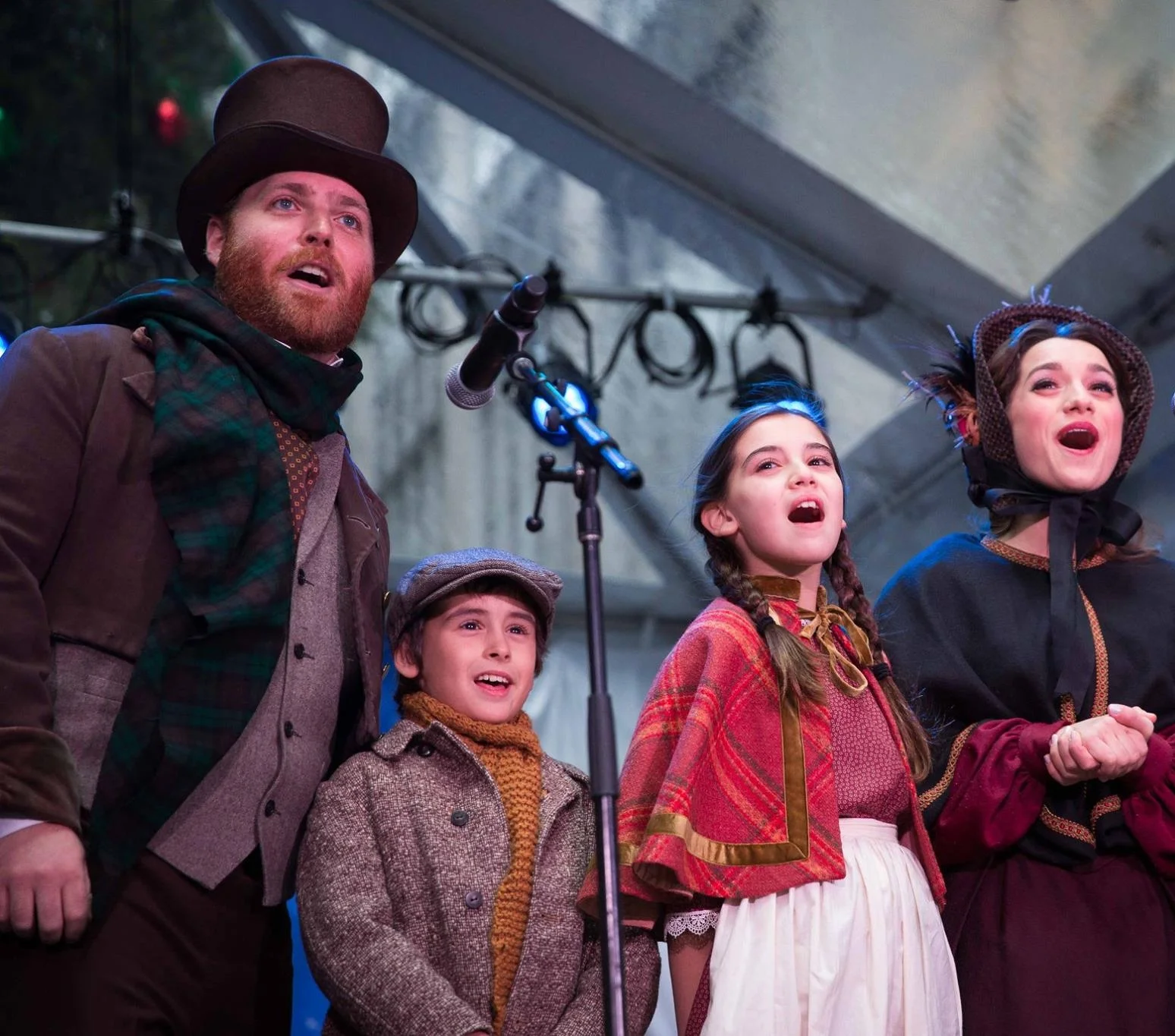 The cast of A CHRISTMAS CAROL sings at the 93rd Annual NYSE Tree Lighting