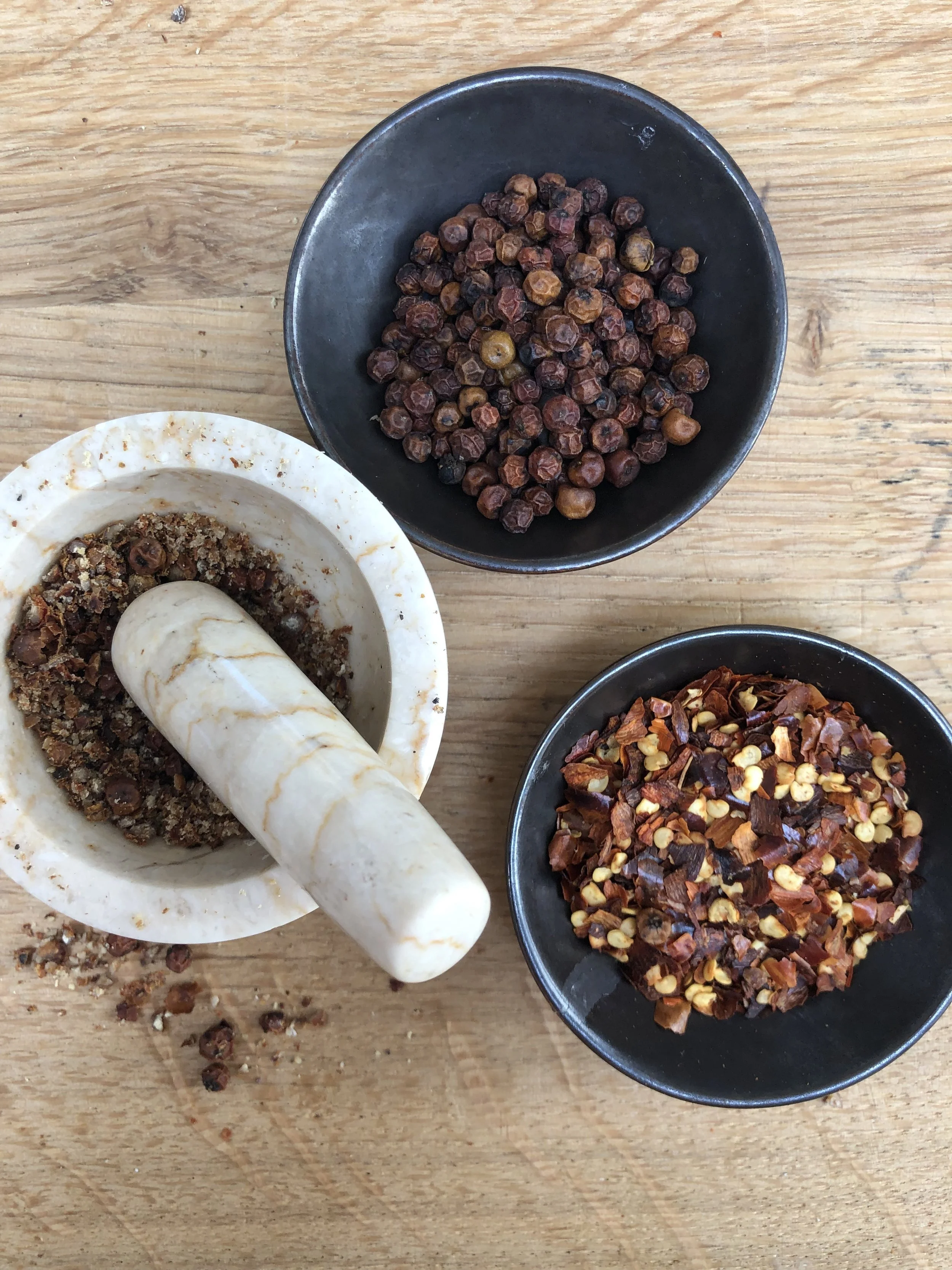 Red Kampot peppercorns and dried chilli flakes
