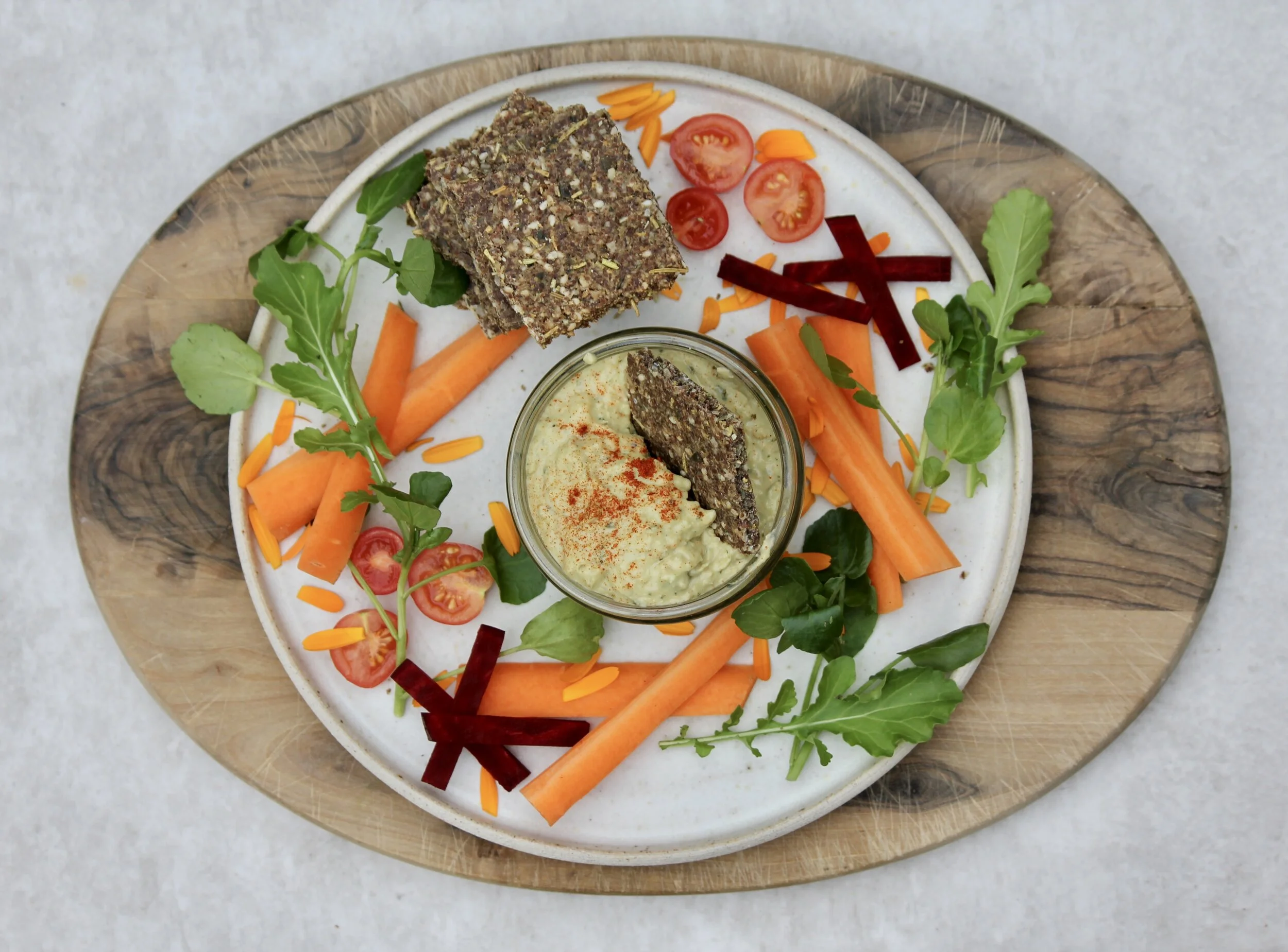 Linseed and Rosemary Crackers with Hummus and Salad