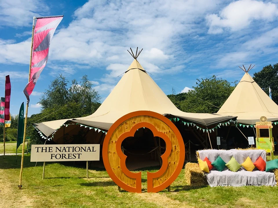 FUN AT THE AWARD WINNING NATIONAL FOREST TIMBER FESTIVAL. SHIRLEY GLEESON LEAD A NUMBER OF FOREST BATHING EXPERIENCES FOR FESTIVAL GOERS