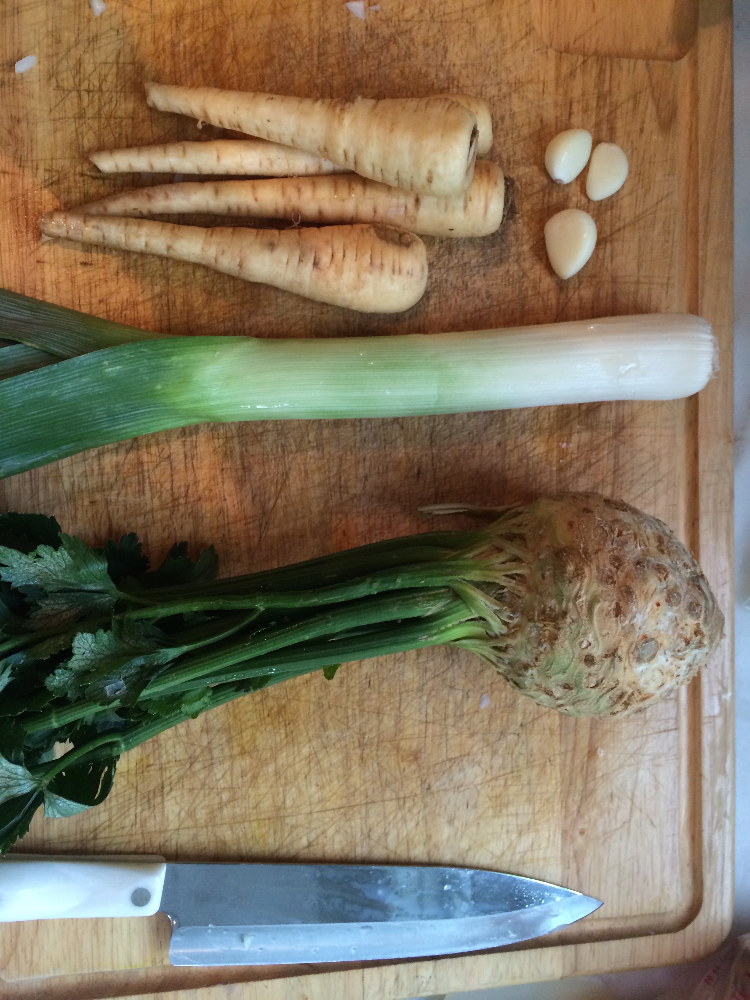 Chop Ingredients - Parsnips, Garlic cloves, Celery Root, Leek, Onion   