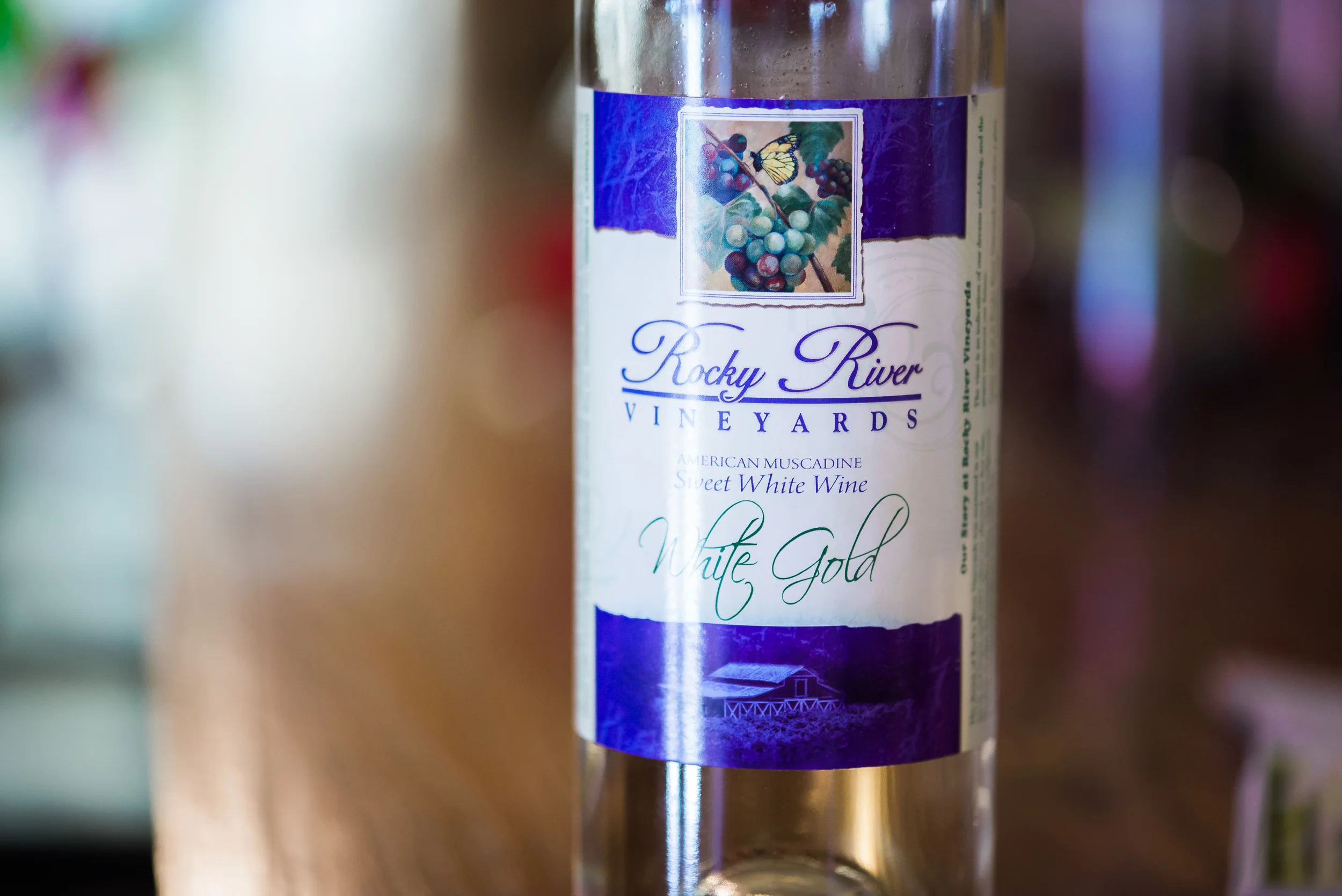 " Made from the Carlos Muscadine. Sweet and bold with a clean, fresh finish. Simply refreshing. Enjoy White Gold with fresh fruits, cheeses and nuts, also pair with spicy foods."