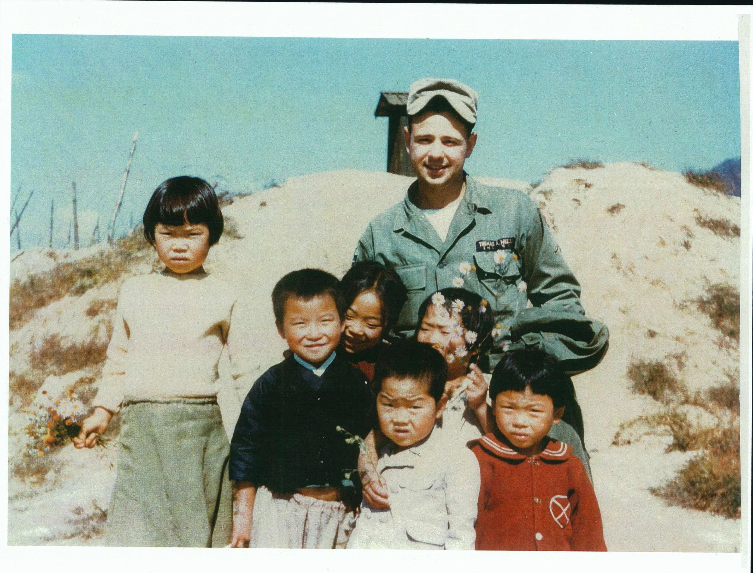 soldier with kids.JPG