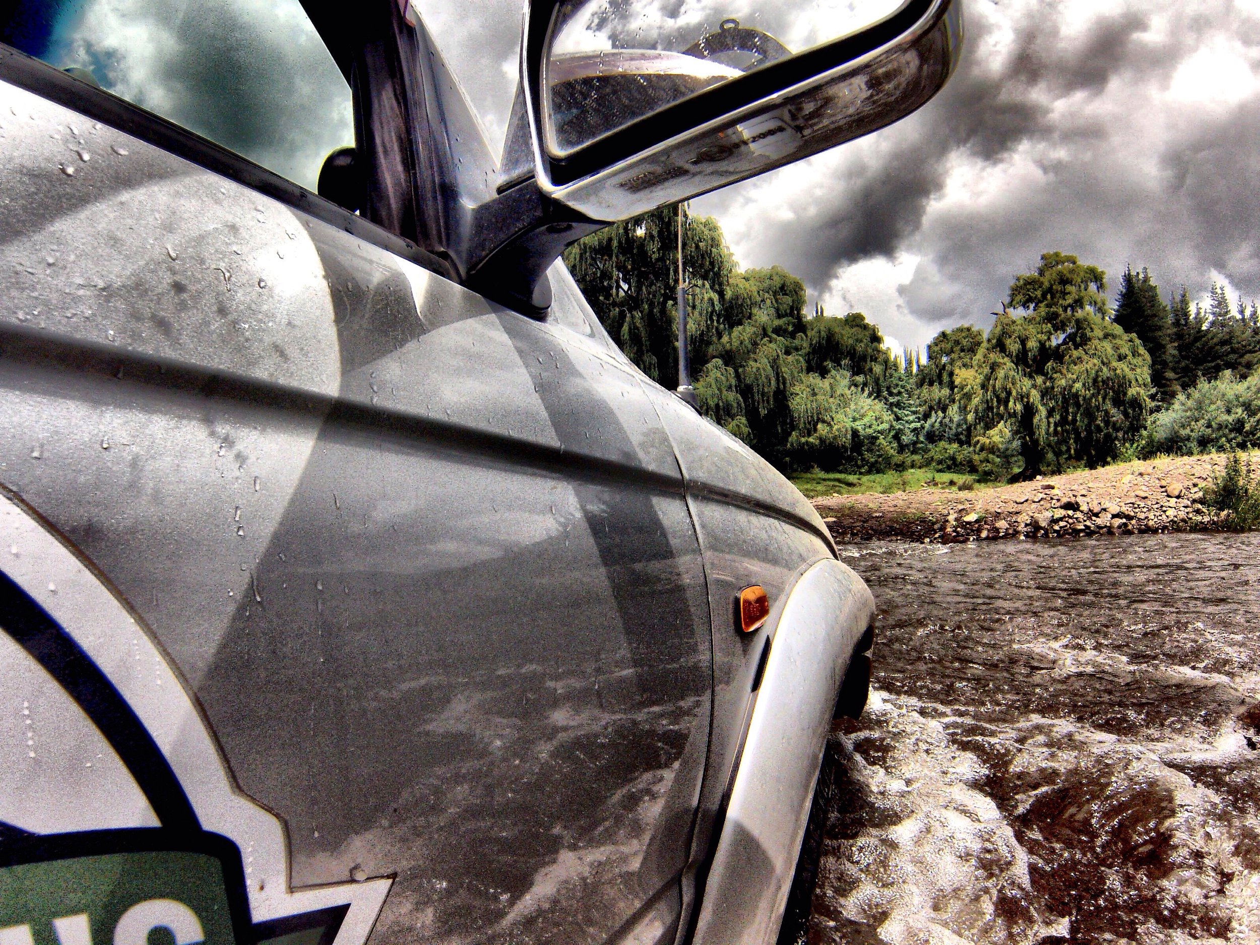 Our car 'Schwampy' swimming his way through the river.