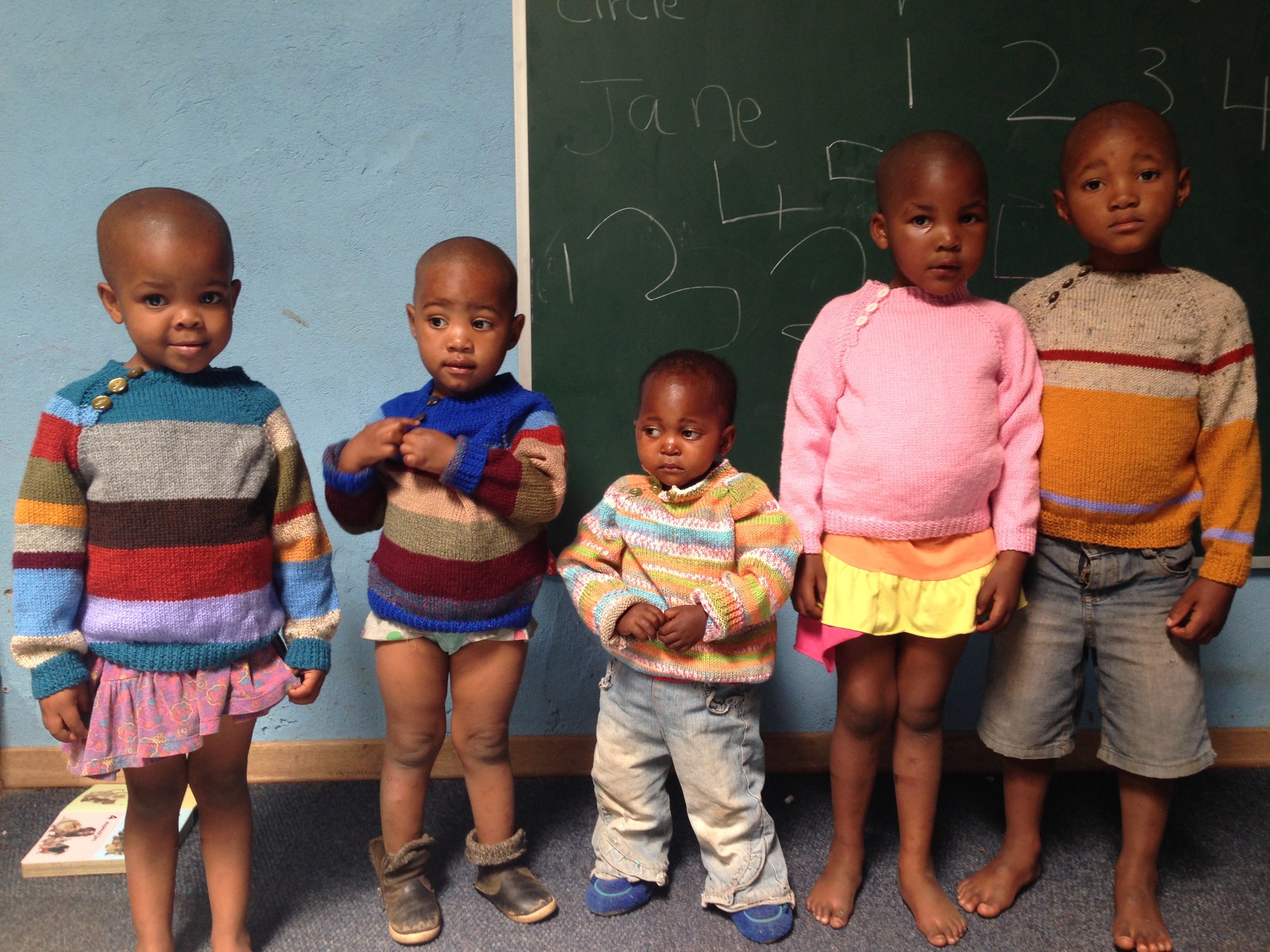 Mr Thabo in the middle. The same age as the Aggie on his right.