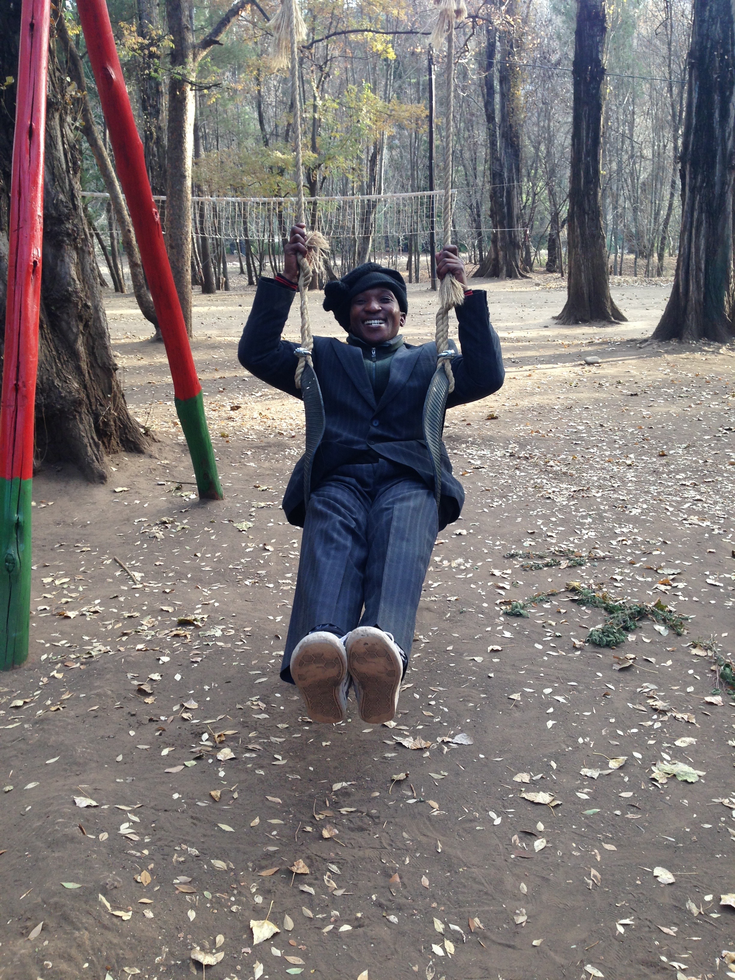 Ntate Labone, our senior house father, taking a break on the sings.