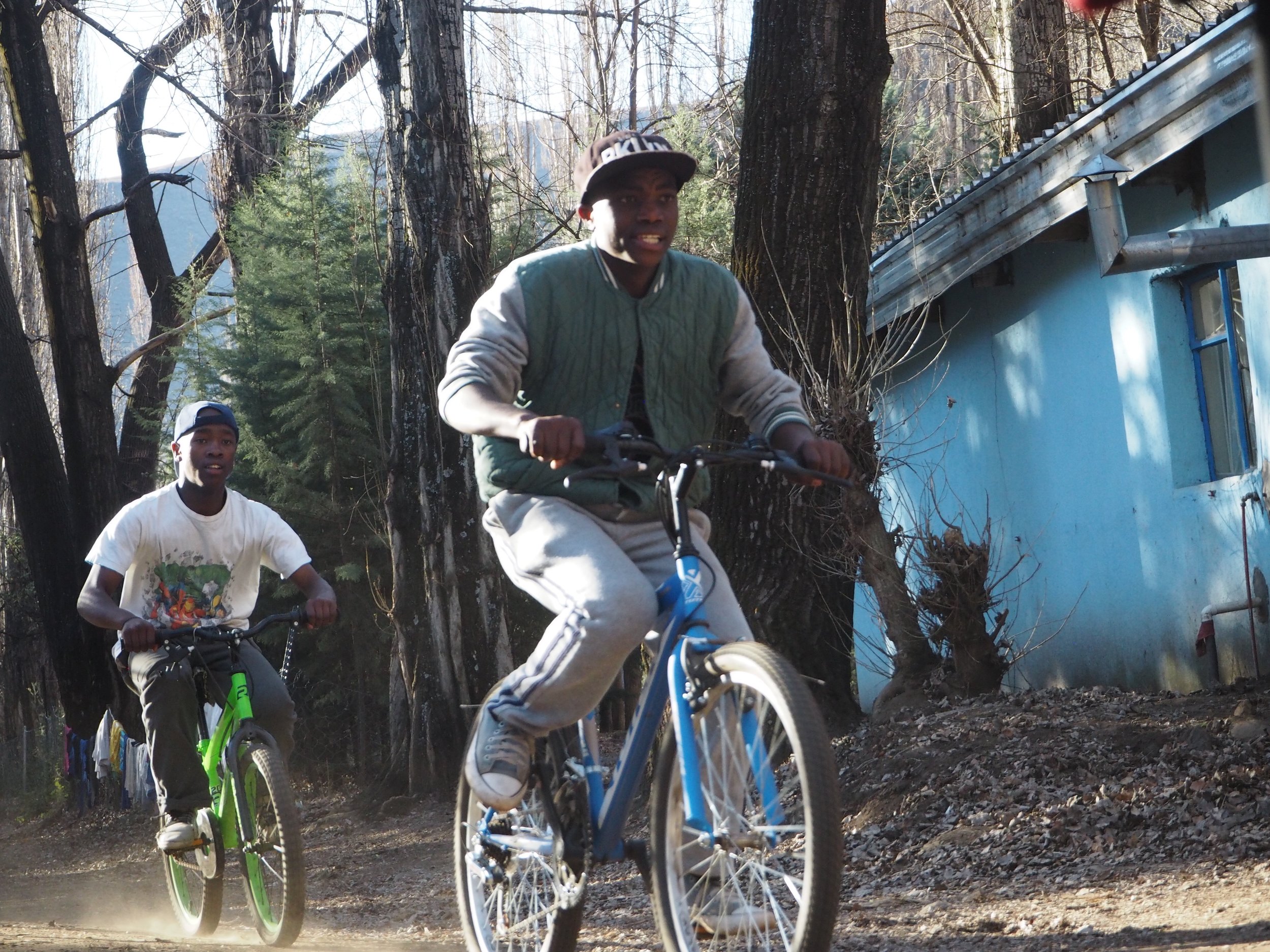 The boys enjoying a Saturday racing bikes