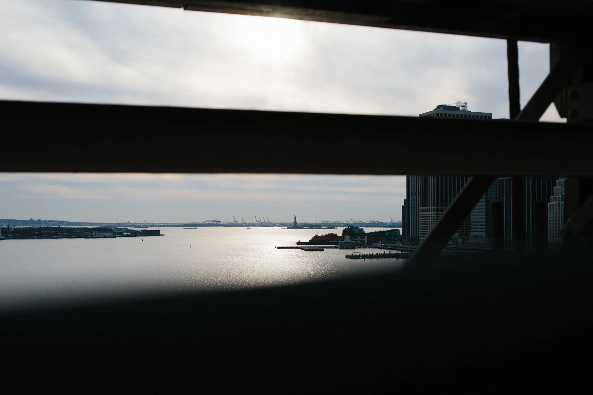 The Statue of Liberty from the Brooklyn Bridge.