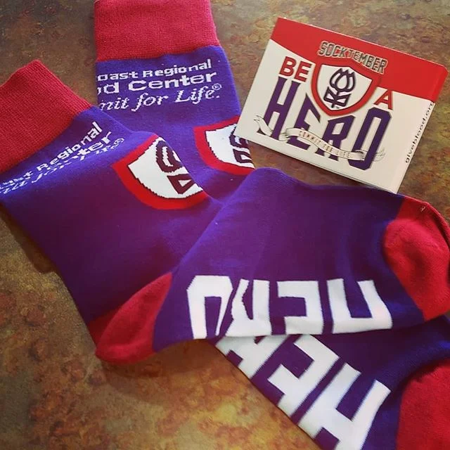 Be A Hero! Donate in #Socktember and get these sweet socks❤️ Each donation saves up to 3 lives😀 #commitforlife see my friend Hope at #gulfcoastregionalbloodcenter