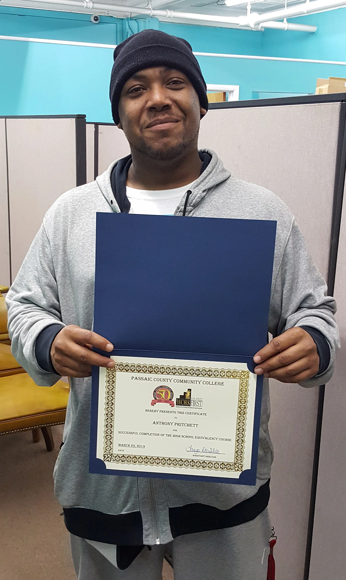 Anthony with diploma (blog).jpg