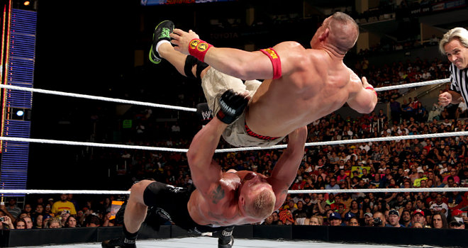 Credit to some guy who got a really good photo of Brock Lesnar dumping John Cena on his big fat stupid head. 
