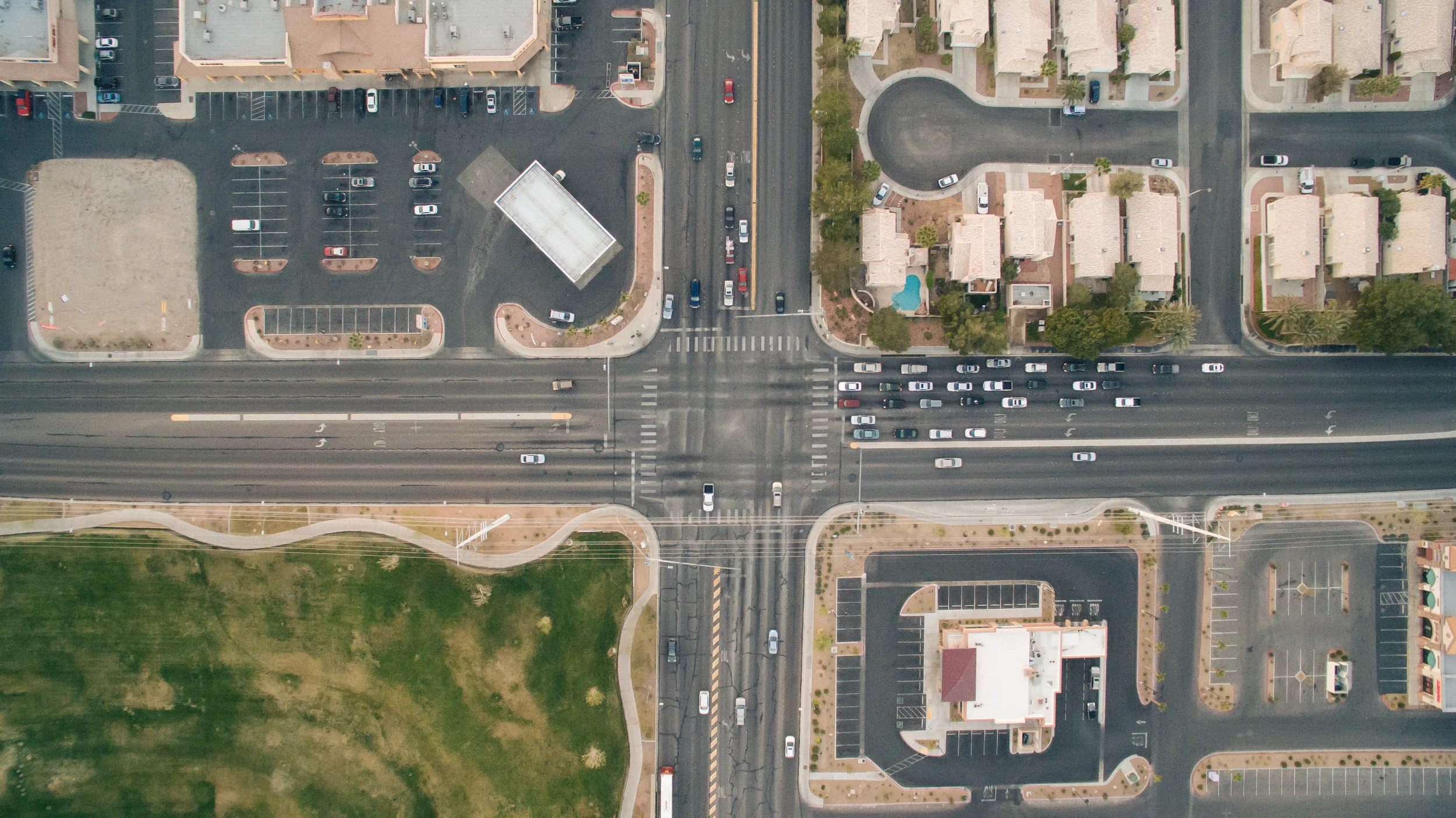 bird-s-eye-view-cars-crossing-crossroad.jpg