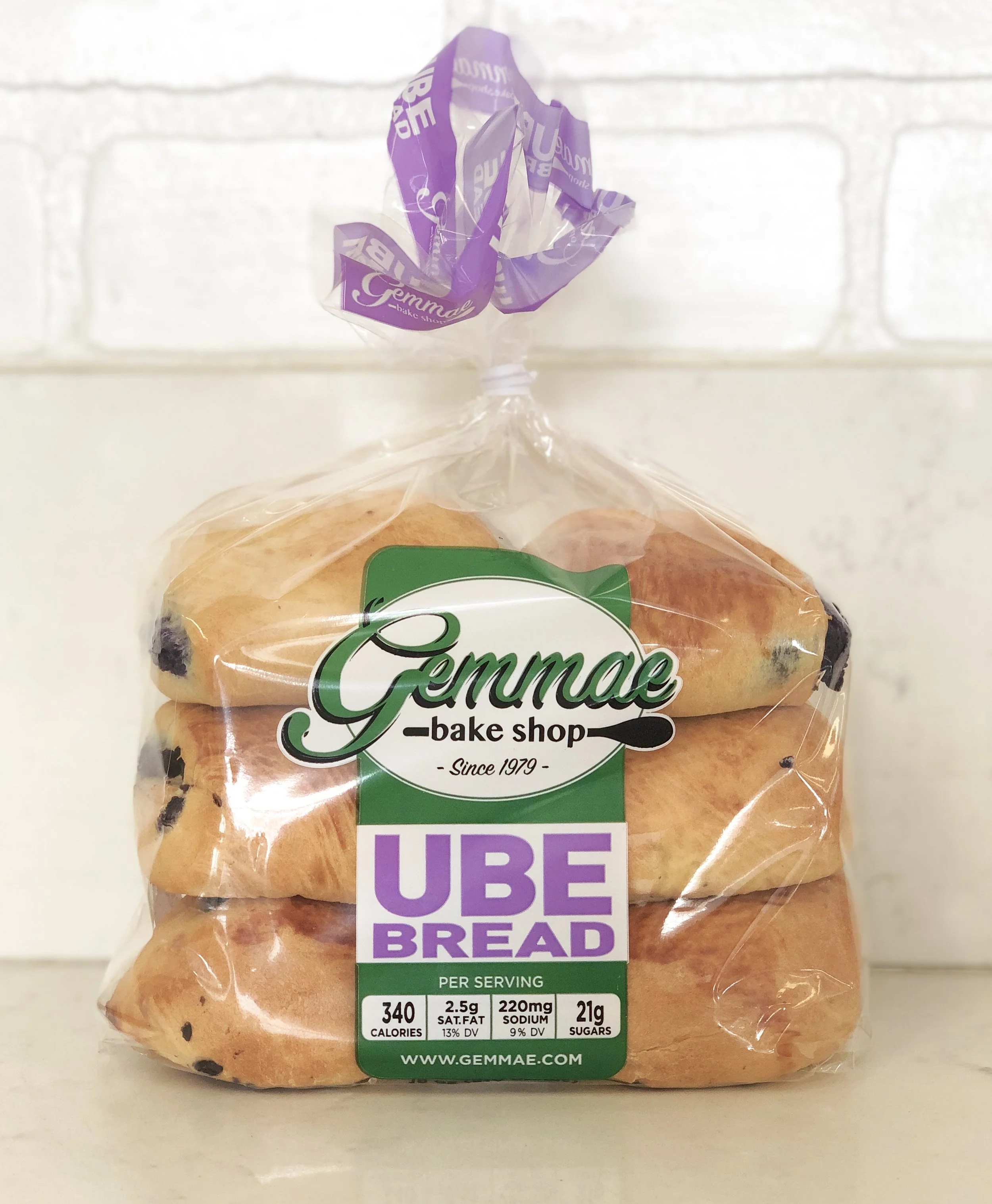 UBE BREAD Soft bread roll stuffed with our rich house made Ube (sweetened purple yam) filling. One bag contains 6 pieces. Toast for best flavor.