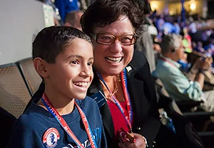 One of Camhi's driving passions was getting future generations involved in the political process, and sharing her optimistic view of politics as a vital way to improve people's lives. She sparked her grandson Alec's lifelong interest in politics in many ways, including when she took him to the 2008 Democratic Convention.