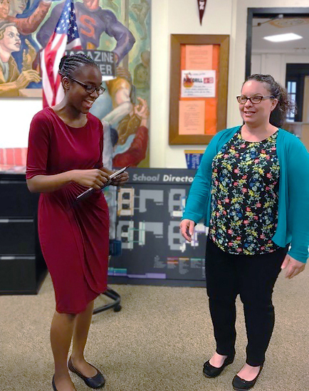 Minasdine Rene (L) with teacher Gina Figliuzzi