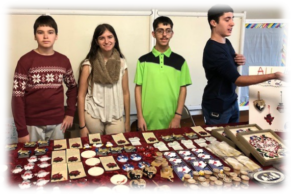 Selling Christmas items to provide a gift of a goat, flock of chicks, and rabbits for needy families around the world who are struggling to lift themselves out of poverty.