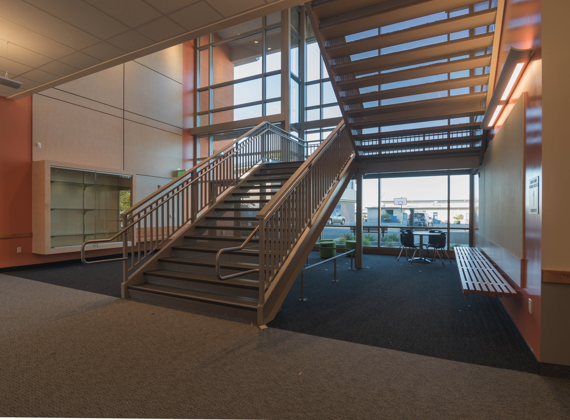 Spaces around the entry lobby and stair are designed as small group learning areas at Burlingame Intermediate School.