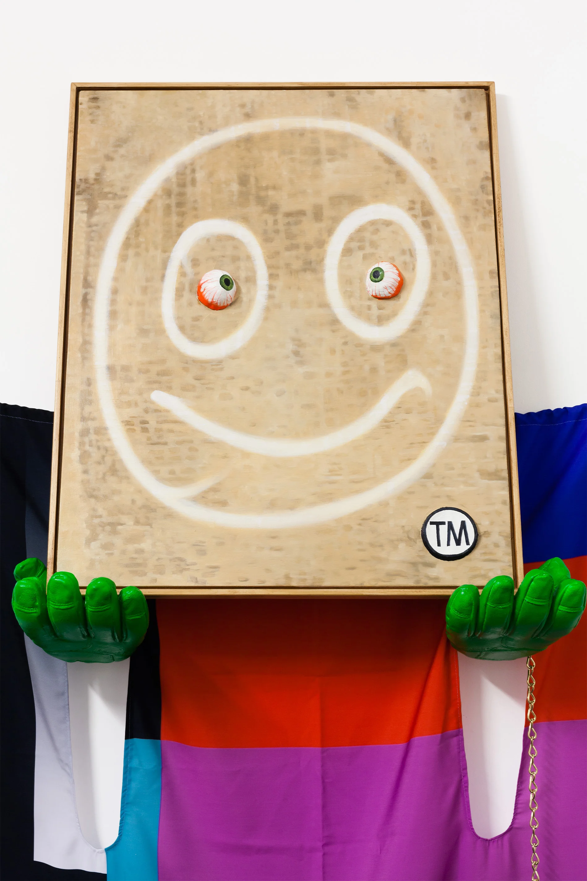 'Mike TV' detail, oil on clay & board, plaster, digital print, brass and cotton embroidery. 2015. Photo courtesy of Taryn Ellis